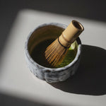 Gifu Chawan lifestyle shot — morning ritual, matcha bowl in hands, Slow Social Club