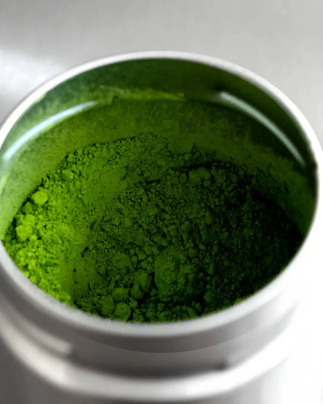 Okumidori Ceremonial Matcha tin on dark background — premium ceremonial grade